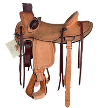 Load image into Gallery viewer, 16" 58 Wade saddle with full double rigging, rough-out golden leather, and Wyoming tooling for a classic look.
