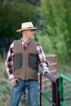 Load image into Gallery viewer, Concealed Carry Hunting Vest made of premium nubuck leather with two holsters, game pocket, and reinforced stitching for durability.