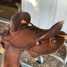 Load image into Gallery viewer, Serpentine border tooling and J7 arrow conchos on the Geo-Aztec Alamo Air Barrel Saddle.