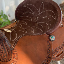 Load image into Gallery viewer, Handmade Geo-Aztec Alamo Air Barrel Saddle with detailed serpentine border tooling and suede seat.