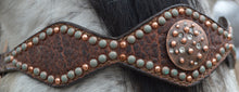 Load image into Gallery viewer, 2046-RW Diamond Browband Headstall featuring golden leather, redwood elephant overlay, and patina spots for a bold Western look.