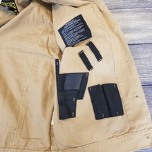 Load image into Gallery viewer, Durable Chisum Concealed Carry Canvas Jacket with hidden holsters, magazine holders, and adjustable cuffs.