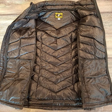 Load image into Gallery viewer, Women's McKinley Down Vest - Fabric Close-up highlighting the down-proof polyester shell and lining designed for durability and warmth.