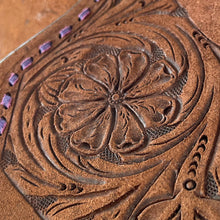 Load image into Gallery viewer, Purple Buckstitch detailing on the 12&quot; Pocket Full of Daisy Barrel Saddle with C5 conchos