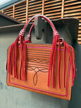 Load image into Gallery viewer, Unique Leave Him on Red Bronco Bag with braided handles and D-rings for attaching straps.