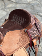 Load image into Gallery viewer, Ranchy Roper Saddle with A-17 PTM tree, full padded seat, and chain border tooling for ultimate comfort.