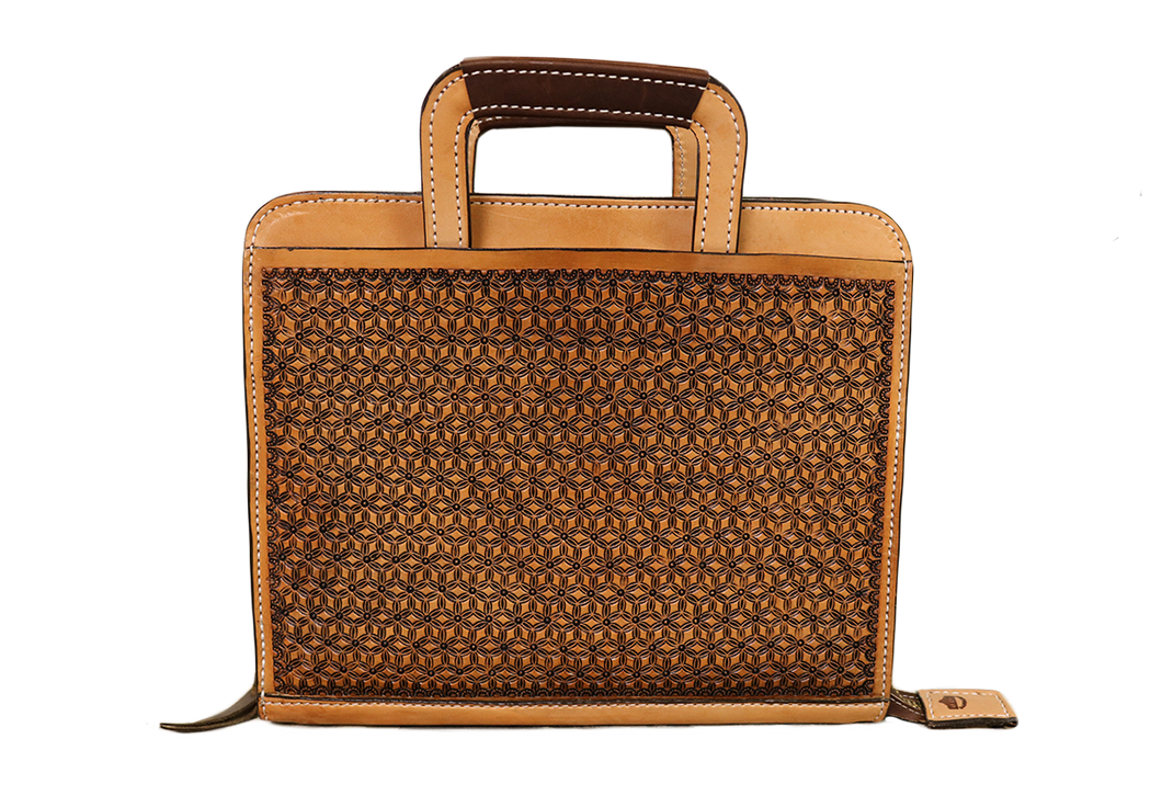 Cowboy Briefcase in golden and chocolate leather with intricate snowflake tooling for a stylish look.