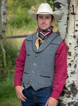 Load image into Gallery viewer, Detailed shot of the Marshall Wool Vest with 24 oz Australian wool, leather yoke trim, lapel, and sleek buttons.