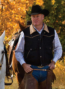 Nevada wool vest in black with water-resistant Australian wool, lambskin collar, western yoke, and satin lining.