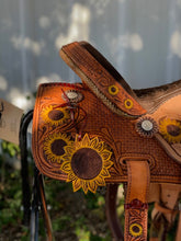 Load image into Gallery viewer, Sunflower tooled saddle