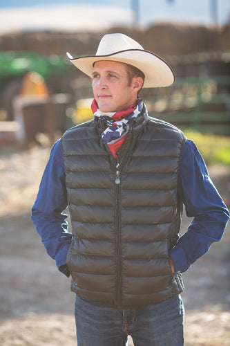 The Teton Down Vest is filled with 180 down, offering warmth with a down-proof polyester shell and YKK zipper for easy closure.