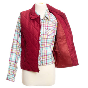 Stylish Women's Savannah Quilted Vest with water-resistant polyester fabric, YKK zipper, reinforced stitching, and adjustable waist strap.
